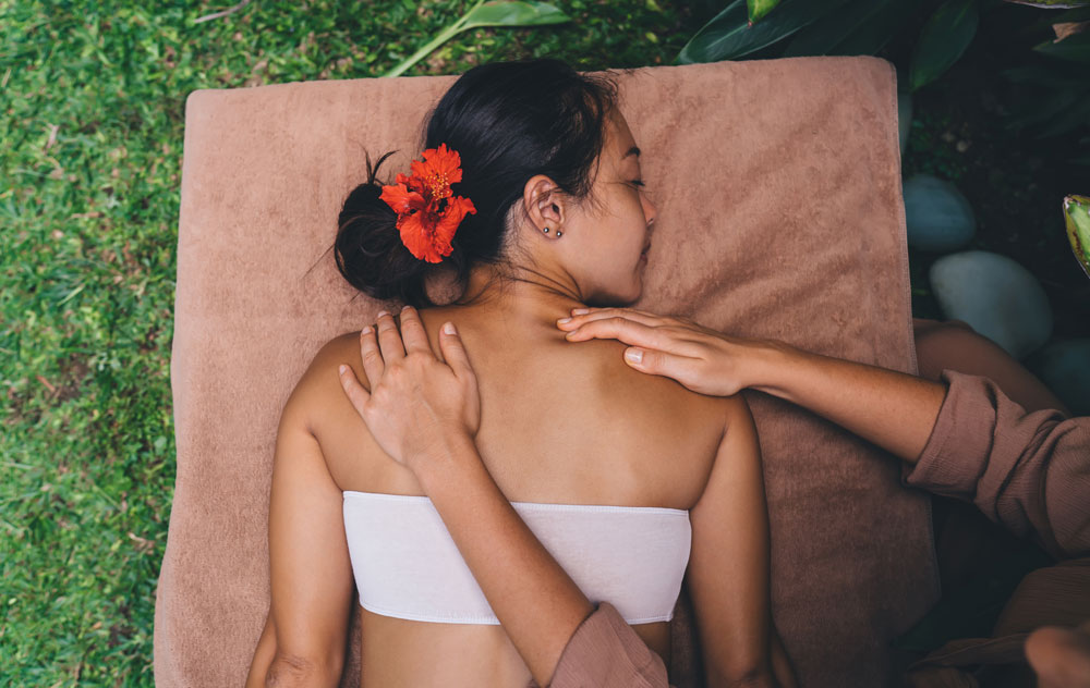 woman receives Therapeutic Massage in Trinity FL for Summer